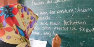 mengajar