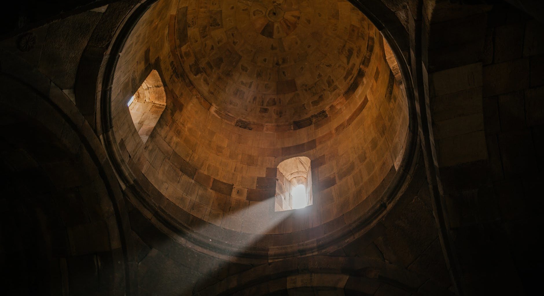old domed ceiling with sunlight shining through window